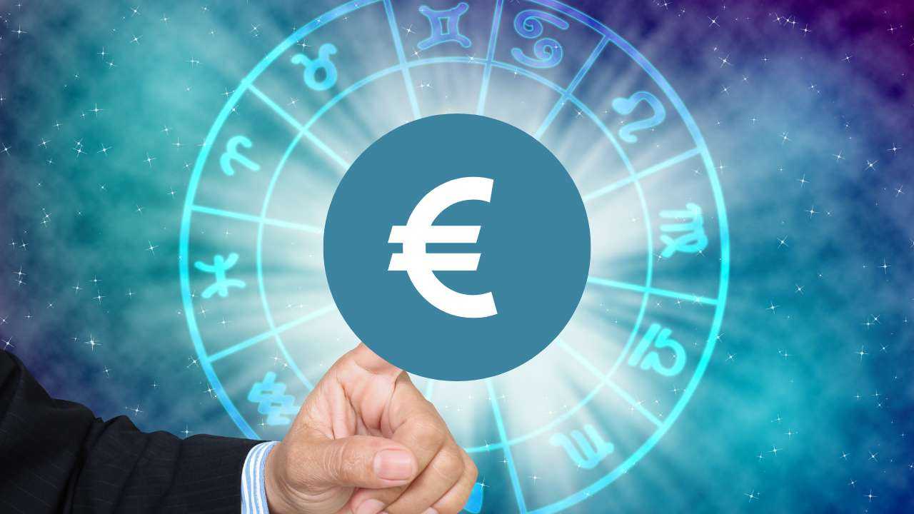 Астрологический круг и в середине символ евро, на который показывает мужская рука – нужно ознакомиться с финансовым гороскопом на март 2023 года
